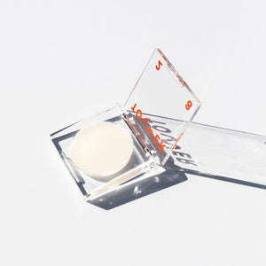 SuperDew Shimmer-Free Highlight Balm in Clear Acrylic Packaging by Tower28 Beauty - In Clear Square Compact Packaging - National Eczema Association's Seal of Approval