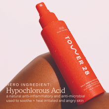 Hero shot of Tower 28 Beauty SOS Daily Rescue Facial Spray 4oz with text overlay: "Hero Ingredient: Hypochlorous Acid, a natural anti-inflammatory and anti-microbial used to soothe + heal irritated and angry skin."